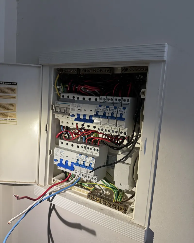 Upgraded residential switchboard with circuit breakers and safety switches installed